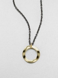 From the Notte Collection. A modern 18k gold open circle pendant on a blackened sterling silver link chain. 18k goldBlackened sterling silverLength, about 16-18 adjustablePendant size, about .7Lobster clasp closureImported 