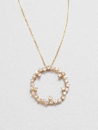 Sparkling white sapphires set in 14k gold with a open circle design on a delicate link chain. White sapphire14k goldLength, about 16Pendant size, about .6 Spring ring closureMade in USA