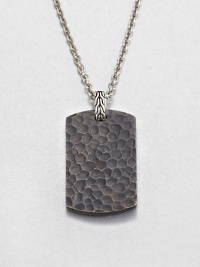 From the Palu Collection. The hand-hammered design motif of the Palu collection distinguishes a blackened bronze dog tag pendant, connected by a sterling silver bale to a bold chain of bright stainless steel.Bronze and sterling silverStainless steelChain length, about 24Pendant, about 2L X 1WLobster claspMade in Bali