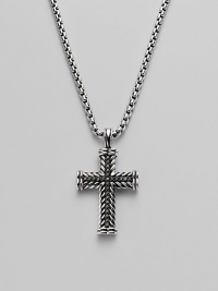 A finely detailed silver chevron cross pendant is centered with brilliant black pavé diamonds. Diamonds, 0.65 tcw Chain length 22 Imported