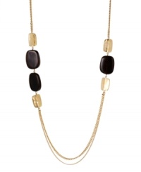 Add a long layer of rich, golden tones and rustic hues to your neckline in Kenneth Cole New York necklace. With brown beads and hammered gold tone discs at the double chain. Crafted in gold tone mixed metal. Approximate length: 28 inches + 3-inch extender. Approximate drop: 1 inch.