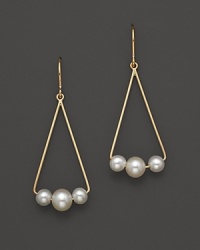 Gleaming freshwater pearls add luster to 14K. yellow gold.