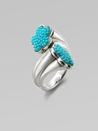 A graduated sterling silver shank with turquoise accented, flower-shaped end caps. TurquoiseSterling silverWidth, about 1Imported