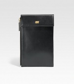 A stylish travel companion with all of the necessary compartments to store your boarding pass, passport, credit cards, money and other important documents, crafted in soft Italian calfskin leather.Zip, snap button closureWrist strapOne bill compartmentSix card slots6W x 8HLeatherMade in Italy