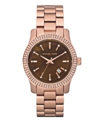 Look on the bright side with this trendy watch by Michael Kors.