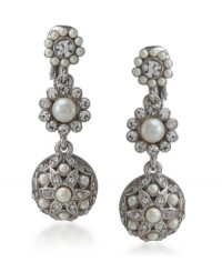 Add a little frosting with these icy white drops by Carolee. Sweet and sumptuous, earrings feature white glass pearls and sparkling glass crystals. Crafted in silvertone mixed metal. Brass clip backing. Approximate drop: 1-1/2 inches.