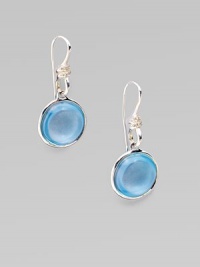 Dazzling diamonds embellish an exquisite blue topaz cabochon stone set in sleek sterling silver. Blue topazDiamonds, .09 tcwSterling silverLength, about 1¼Hook backImported 