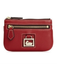 Change is good. Keep yours handy (and your keys too) in this pebbled leather pouch by Dooney & Bourke.