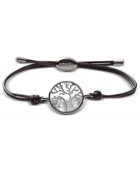 Plant your roots in rich fashion. This Fossil bracelet features a polished steel coin pendant with cut-out tree detail. Strung on an adjustable chocolate brown leather cord. Approximate diameter: 2-1/2 inches.