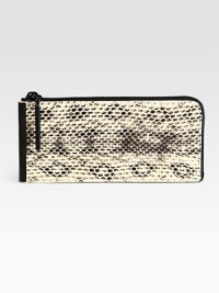 Carry your essentials in this textured leather design for an exotic-inspired look. Zip-around topOne inner zip compartmentEight credit card slots7¾W X 3½H X ¾DImported