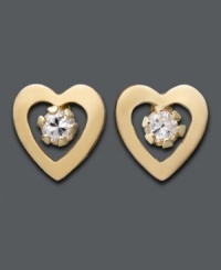 Simply sweet. Polished 14k gold hearts frame gleaming cubic zirconia accents in these stud earrings for a special little girl.