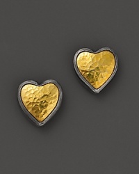 Hammered 24K yellow gold and sterling silver heart earrings make a romantic, modern statement.