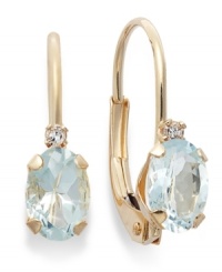 Sparkling perfection. Add a vibrant pop of color to your look with oval-cut aquamarine (3/4 ct. t.w.) and sparkling diamond accents. Crafted in a 14k gold leverback setting. Approximate drop: 3/4 inch.