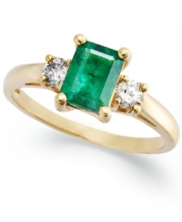 Enviable green hues. This vibrant 14k gold ring features an emerald-cut emerald (3/4 ct. t.w.) and round-cut diamond side stones (1/5 ct. t.w.).