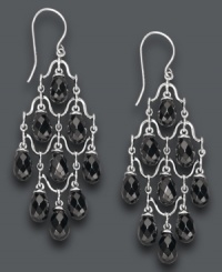 Perfect your soiree look with statement-making earrings. A delicate sterling silver setting highlights faceted, pear-shaped onyx stones (5 mm x 8 mm). Approximate drop: 2 inches.