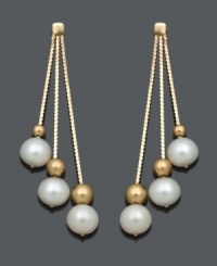 The best of both worlds -- these Belle de Mer earrings combine traditional pearls with bold style. Set in 14k gold, three graduated drops feature cultured freshwater pearls (6-7 mm) and gold bead accents. Approximate drop: 1-3/4 inches.