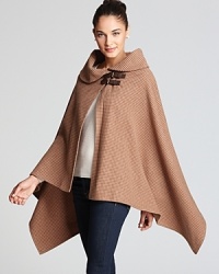 Buckle up this haute houndstooth poncho from Lauren Ralph Lauren for an equestrian-inspired look.