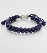 From the Spirited Bead Collection, this two-row beaded bracelet is handsomely crafted from 6mm lapis beads with an adjustable sterling silver beaded clasp.Sterling silverLapisAbout 9 longAbout 3 diam.Imported