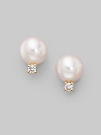 From the Akoya Collection. Classic white cultured pearl studs with sparkling diamond accents set in 18k gold. 6mm white round cultured pearls Diamonds, 0.06 tcw 18k yellow gold Post back Imported