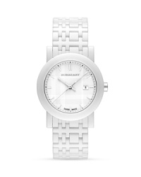 A white ceramic, check inspired link bracelet adds polished modernism to your wrist. From Burberry. Made in Switzerland.