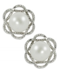 Elegance is always in season, just like this pair of sterling silver stud earrings. Cultured freshwater pearls (9-10 mm) and round-cut diamonds (1/10 ct. t.w.) give the pair of flower earrings a stylish touch. Approximate diameter: 5/8 inch.