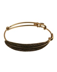 A bohemian-inspired feather adorns this delicate, expandable Alex and Ani bangle, which is crafted entirely from recycled brass.