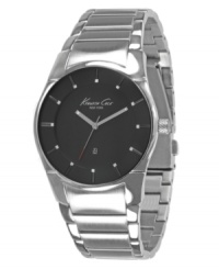 Streamline your style. This sleek KCNY watch features a smooth stainless steel bracelet and round case. Matte black dial with luminous stick indices, logo and date window. Analog movement. Water resistant to 30 meters. Limited lifetime warranty.