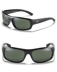 Whether it's a jaunt on the beach or hitting a few holes on the course, don't forget these sporty rubber wrap sunglasses with polarized lenses from Ray-Ban.