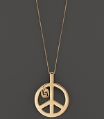 A simple, elegant peace sign in 14K yellow gold. By Lana.