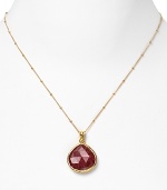 With a faceted ruby pendant pendant, Coralia Leets' 22-karat gold necklace is elegance simplified. Day or after dark, this piece slips on to give a spectrum of looks tonal sparkle.