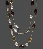 A mix of colorful quartz and clear crystal stations on a 14K yellow gold chain.