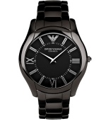 Sleek sophistication. Slim-profile watch by Emporio Armani crafted of black ceramic bracelet and round case. Black dial features silver tone Roman numerals, minute track, two hands and logo. Quartz movement. Water resistant to 30 meters. Two-year limited warranty.