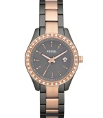 Surrounded by shimmering crystal accents, this elegant yet casual Stella watch from Fossil brings a wonderful change-of-pace to your daily look.