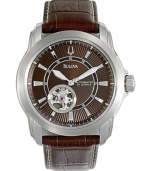 A gentleman's watch, by Bulova. Brown leather strap and round stainless steel case. Textured brown dial with silver tone stick indices, logo, transparent window and two hands. Self-winding mechanical movement. Water resistant to 30 meters. Three-year limited warranty.