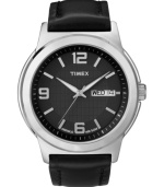 Timex updates a classic dress watch with the addition of contemporary details. Black leather strap and round silver tone mixed metal case. Black dial with inner grid-patterned dial features silver tone numerals at twelve, six and nine o'clock, stick indices, day and date window at three o'clock, luminous hands, and logo. Quartz movement. Water resistant to 30 meters. One-year limited warranty.