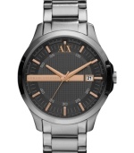 AX Armani Exchange adds warmth to a classic watch design with rose-gold tone accents.